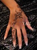 tatouage delicat paillet noir