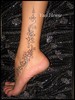 tatouage paillet noire cheville